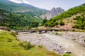 Old bridge above Black Drin river near village Malqene in Albania Royalty Free Stock Photo