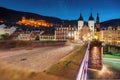 Old Bridge (Alte Brucke) at night with Bruckentor (Bridge Gate) and Heidelberg Castle - Heidelberg, Germany Royalty Free Stock Photo