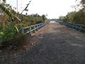 the old bridge connecting the village of Lalangan with the village of Solor, East Java, Indonesia