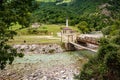 Old bridge in Dragobi over river Lumi i Valbones National Park Valbona in Albania, Europe Royalty Free Stock Photo