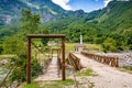 Old bridge in Dragobi over river Lumi i Valbones National Park Valbona in Albania, Europe Royalty Free Stock Photo