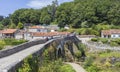 The Old Bridge, a medieval bridge over the river Tambre along the Camino de Santiago. Galicia, Spain.