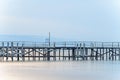 Old bridge over the mystical blue sea water, The Black Sea shore