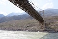 Old bridge over the river Katun, Altai, Russia. Royalty Free Stock Photo