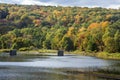 Old bridge pillars stand in the Farmington River, Collinsville, Royalty Free Stock Photo