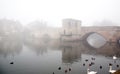 St Ives, Cambridgeshire - the old bridge fading in the fog Royalty Free Stock Photo