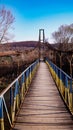 Old bridge, suspension bridge, wooden bridge, road across the river, nature, background Royalty Free Stock Photo