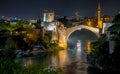 Old bridge and old town in Mostar by night Royalty Free Stock Photo