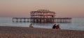 Old Brighton Pier in the sunset - BRIGHTON, UNITED KINGDOM - FEBRUARY 27, 2019 Royalty Free Stock Photo