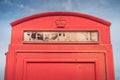 An old British red telephone box, weathered by the salty beach air at Studland, near Sandbanks, Dorset, UK Royalty Free Stock Photo