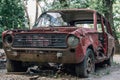 Old broken abandoned rusty retro car