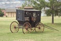 Old Broken Antique Horse Carriage in old western town Royalty Free Stock Photo