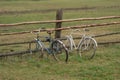 old broken bikes parked by the field Royalty Free Stock Photo