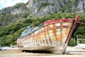 Old broken boat on the coast. Royalty Free Stock Photo