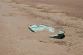 Old broken boat lying on the shore of the Bay Royalty Free Stock Photo