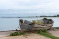 An old broken boat on the shore Royalty Free Stock Photo