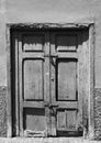 Old broken bolted shut door in an abandoned house Royalty Free Stock Photo