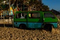 Old broken car on the beach shore in Nha Trang Royalty Free Stock Photo