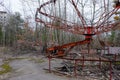 An old broken carousel in the abandoned city of Pripyat. Abandoned amusement park Royalty Free Stock Photo