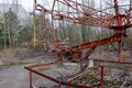 An old broken carousel in the abandoned city of Pripyat. Abandoned amusement park Royalty Free Stock Photo