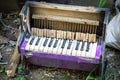 Old broken child piano