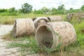 Old broken concrete cement pipe in grass, Royalty Free Stock Photo