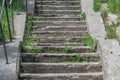 Old broken concrete street stairs without ramp in disrepair. Former soviet street stairs.