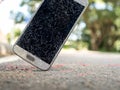 Old broken and cracked screen smartphone Royalty Free Stock Photo