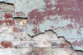 Old broken damaged plastered red brick wall background texture. space for text