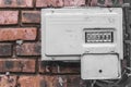 The old broken electrical panel or box of the drawer on the wall. Industrial Abandoned Power Control