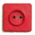 Old broken electrical socket red of wall. A violation electrical safety isolated