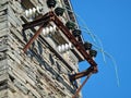 Old broken electrical wires against building Royalty Free Stock Photo