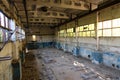 Old broken empty abandoned industrial building interior Royalty Free Stock Photo