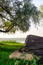 Old broken fishing boat by the river. Close up