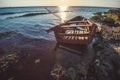 Old broken fishing boat on the shore Royalty Free Stock Photo