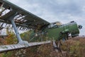 Old broken green russian airplane