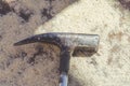 Hammer rusty nails with sawdust Royalty Free Stock Photo