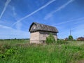 old and broken house made of white bricks on a blue sky background Royalty Free Stock Photo