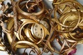Old and broken jewelry, coins, watches of gold, and gold-plated Royalty Free Stock Photo