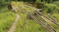 An old and broken overgrown railway Royalty Free Stock Photo