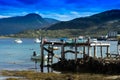 Old broken pier with misc stuff landscape background