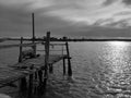 old broken pier in a river