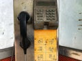 Old and broken public phone