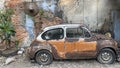 Old broken rusty abandoned car. Royalty Free Stock Photo