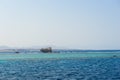 Old broken ship in the sea Royalty Free Stock Photo