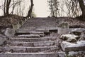 The old broken stairs. Aged stairs up.