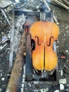 old broken violin is used as firewood