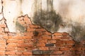 Old broken white wall with the arrangement of red brick Royalty Free Stock Photo