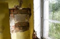 Old broken window and bricks wall in the abandoned house Royalty Free Stock Photo