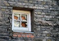 Old broken window and grey wall Royalty Free Stock Photo